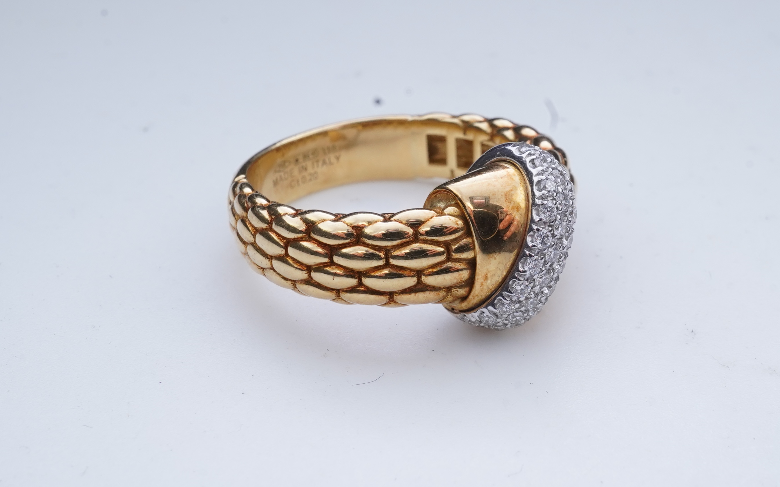 FOPE, a gold and diamond ring